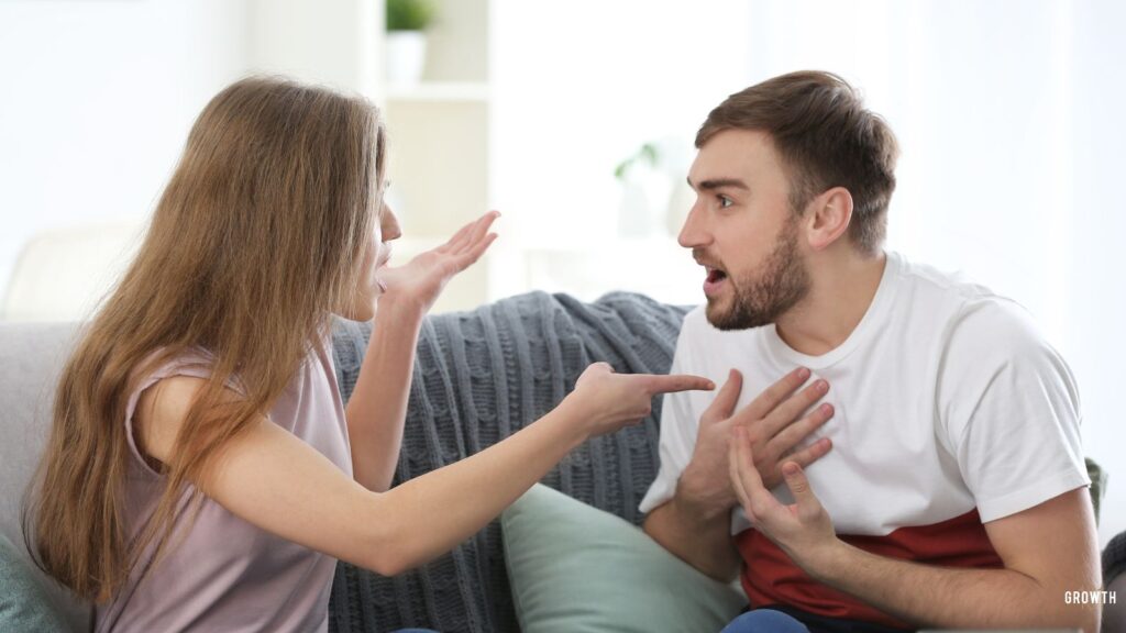 Image of a couple fighting over money