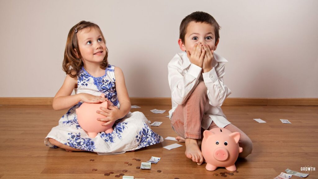 Image of kids sitting around their piggy bank