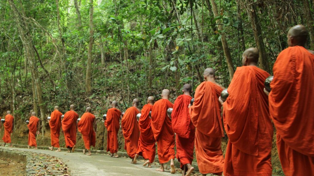 monks walking in a line showing alignment