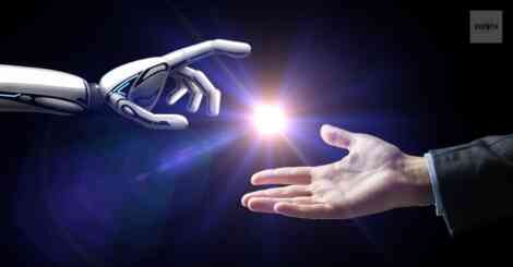 A robotic hand and a human hand reaching out with a glowing light between them, symbolizing the need for a company AI policy to guide responsible collaboration between humans and AI tools.