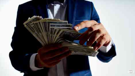 Man counting his money